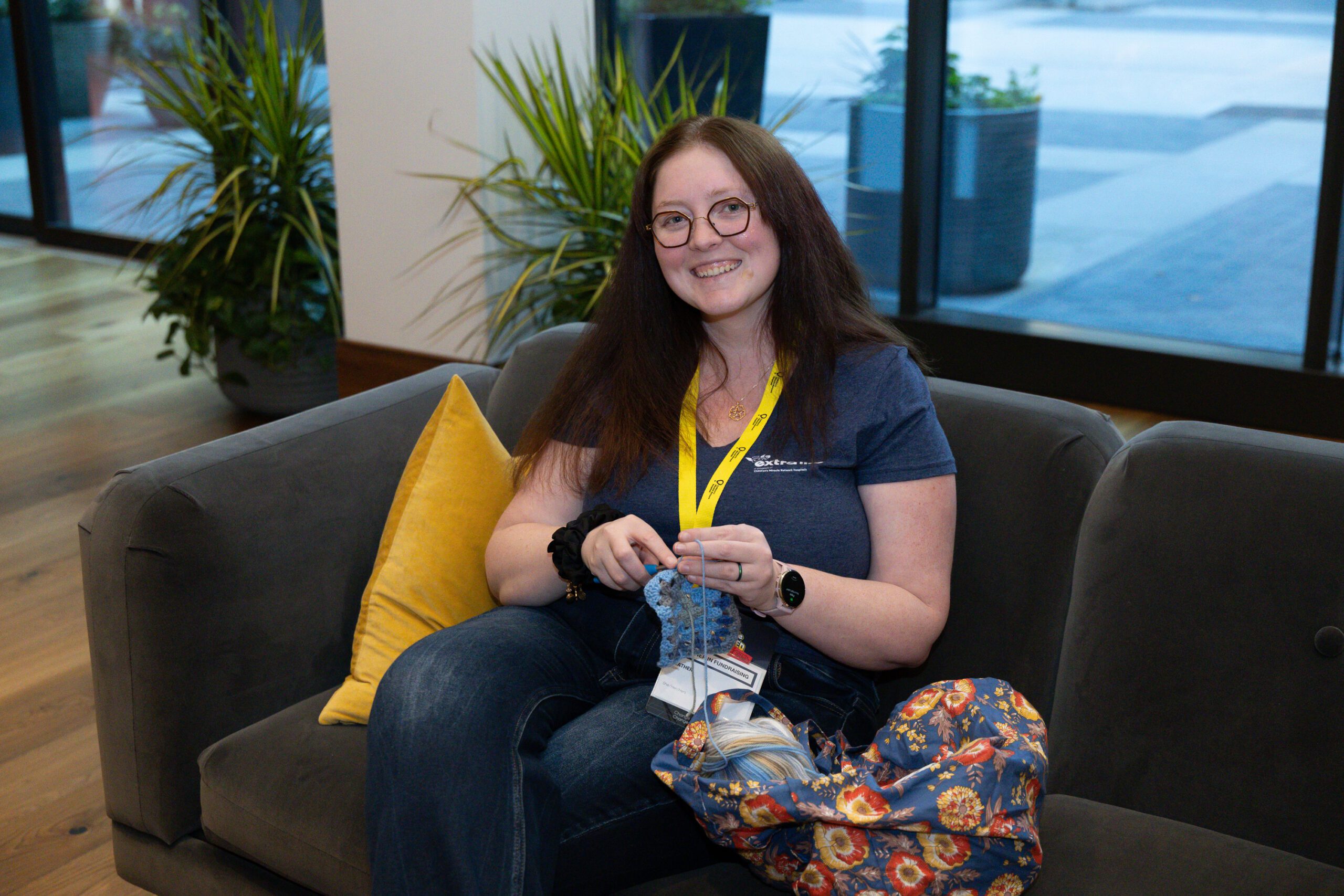 Extra Life participant Heather Strom nitting.