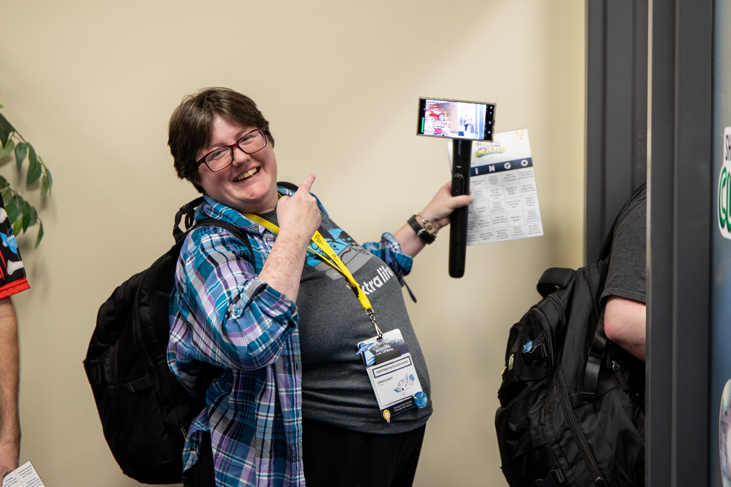 Extra Life participant smiling and holding gimbal.